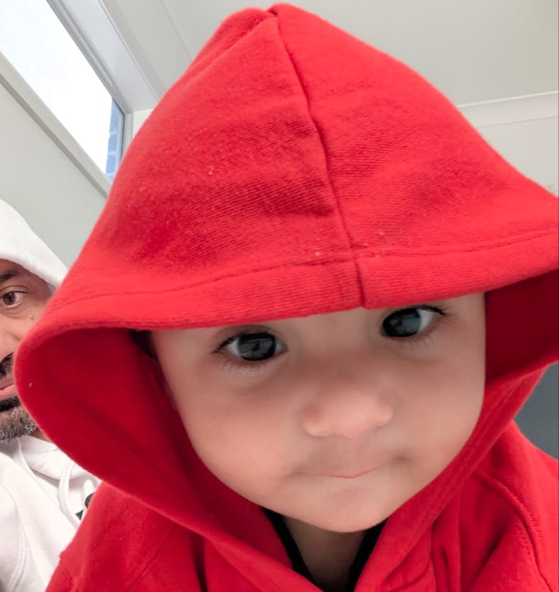 Tayyab in red hoodie